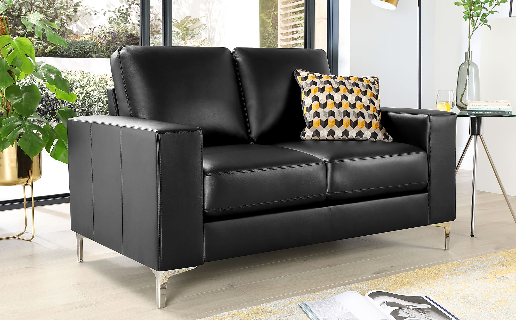 small two seater black leather sofa