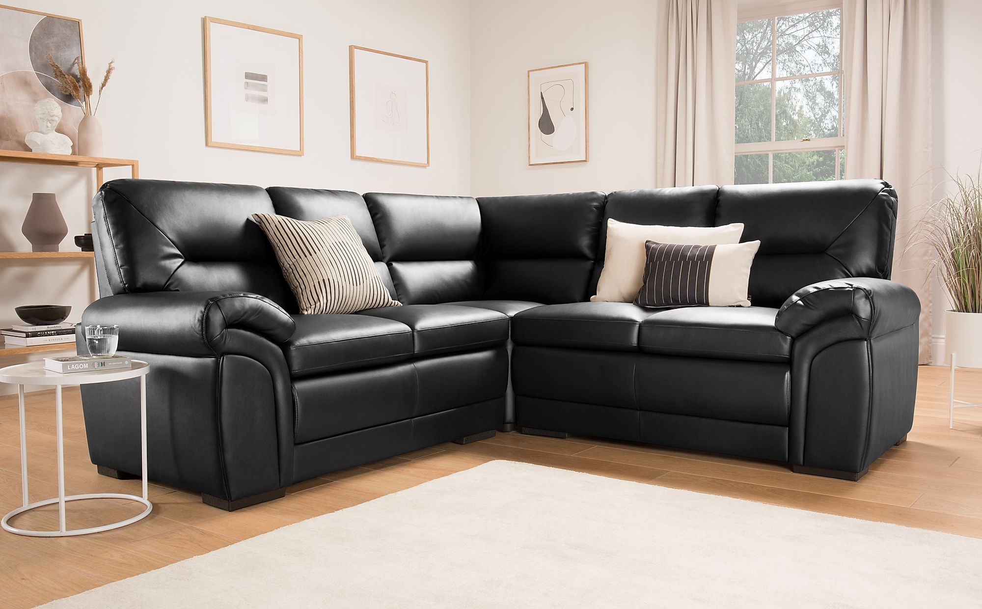black leather and fabric corner sofa