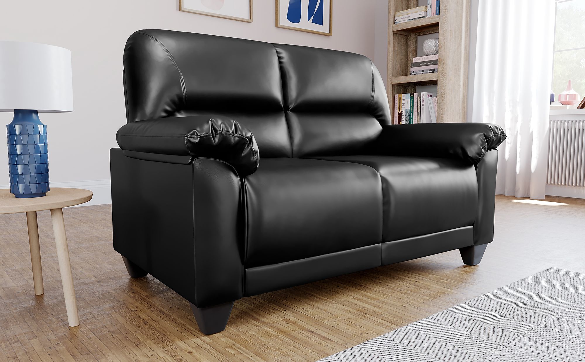 small 2 seater black leather sofa