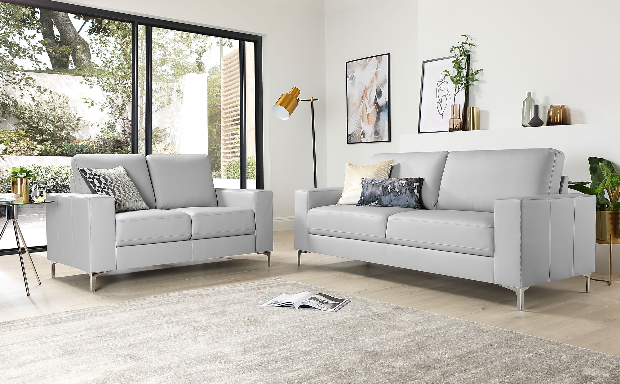 light grey leather sofa and loveseat