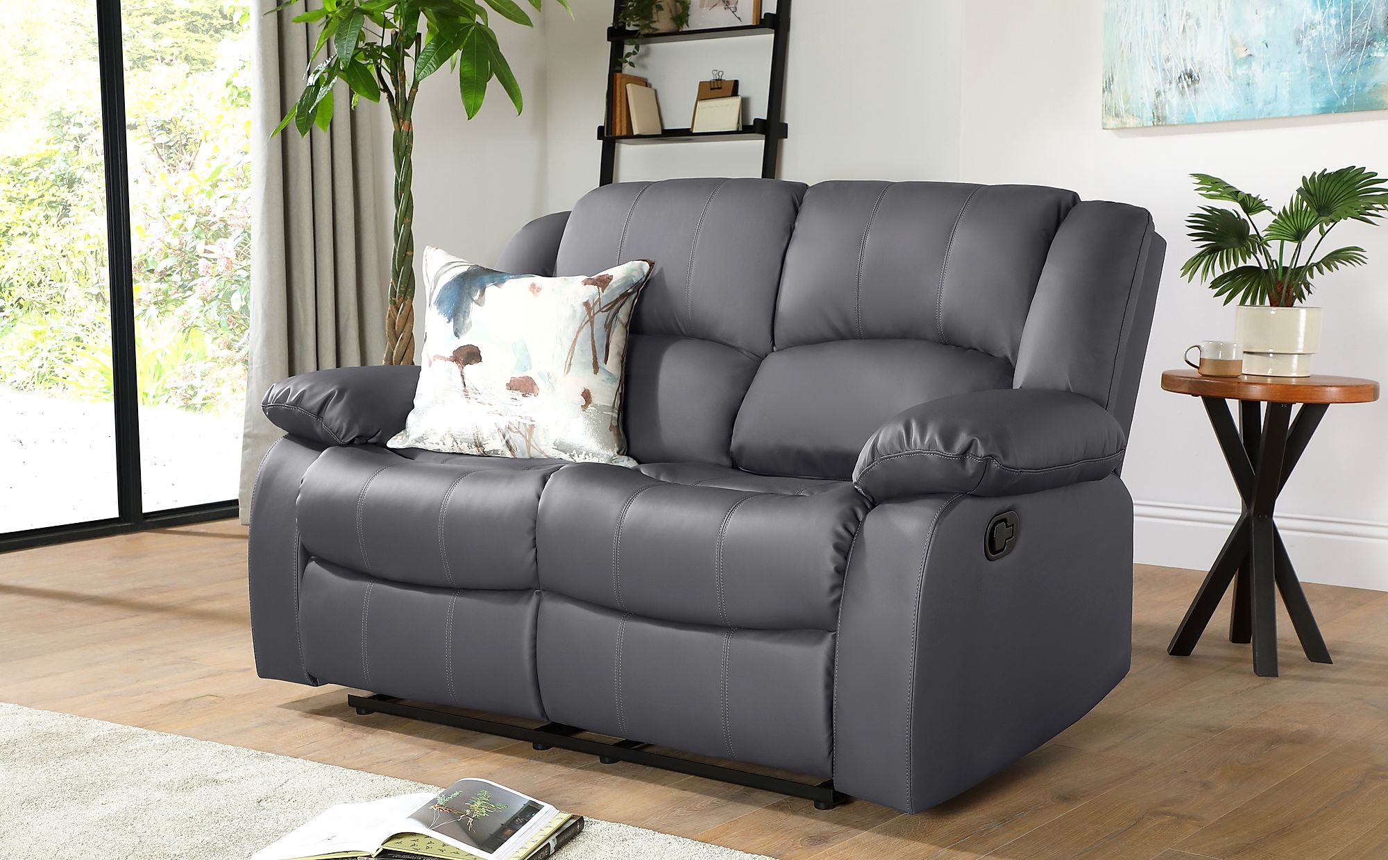 gray sofa with brown leather chair