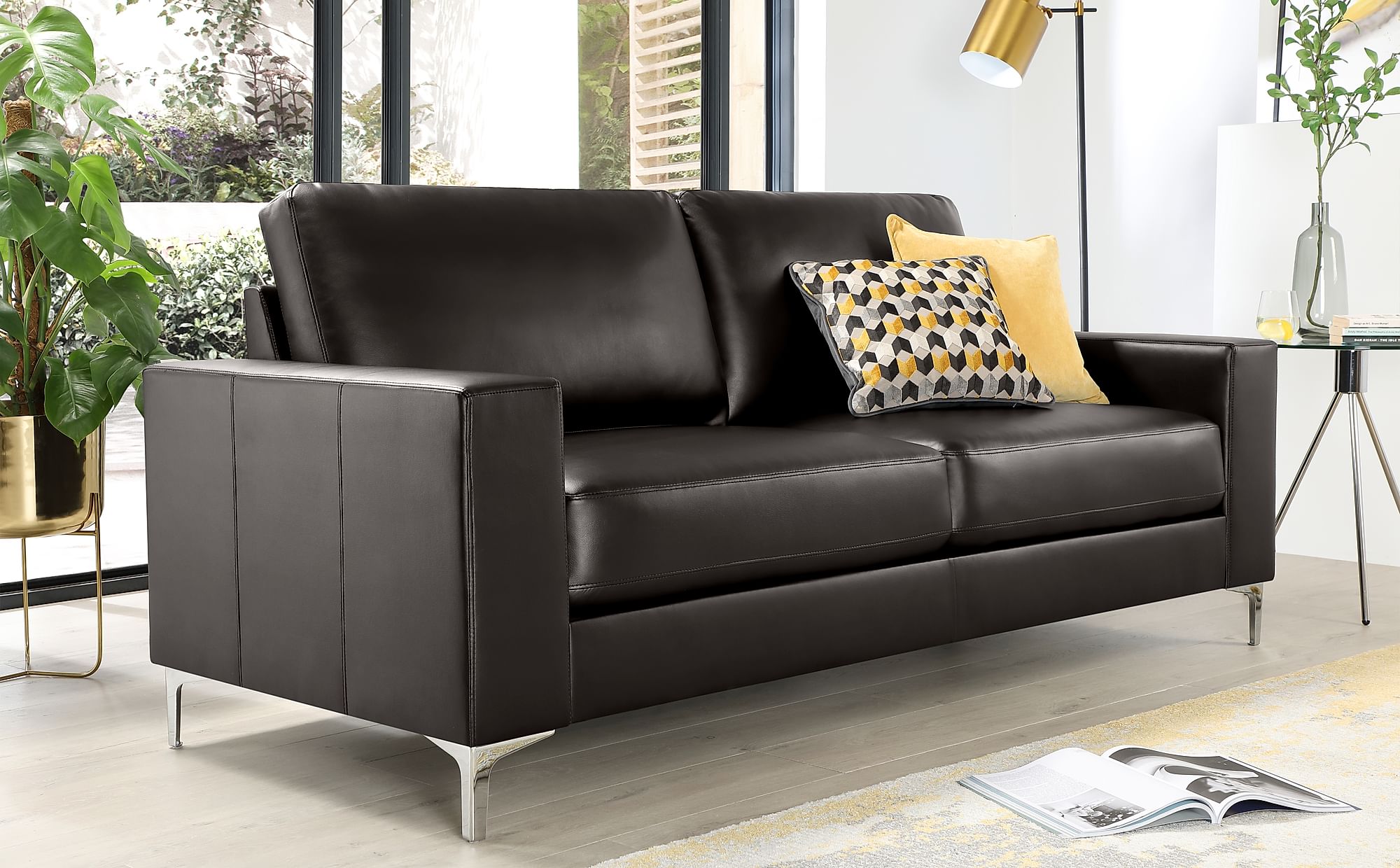 black leather sofa with wooden legs