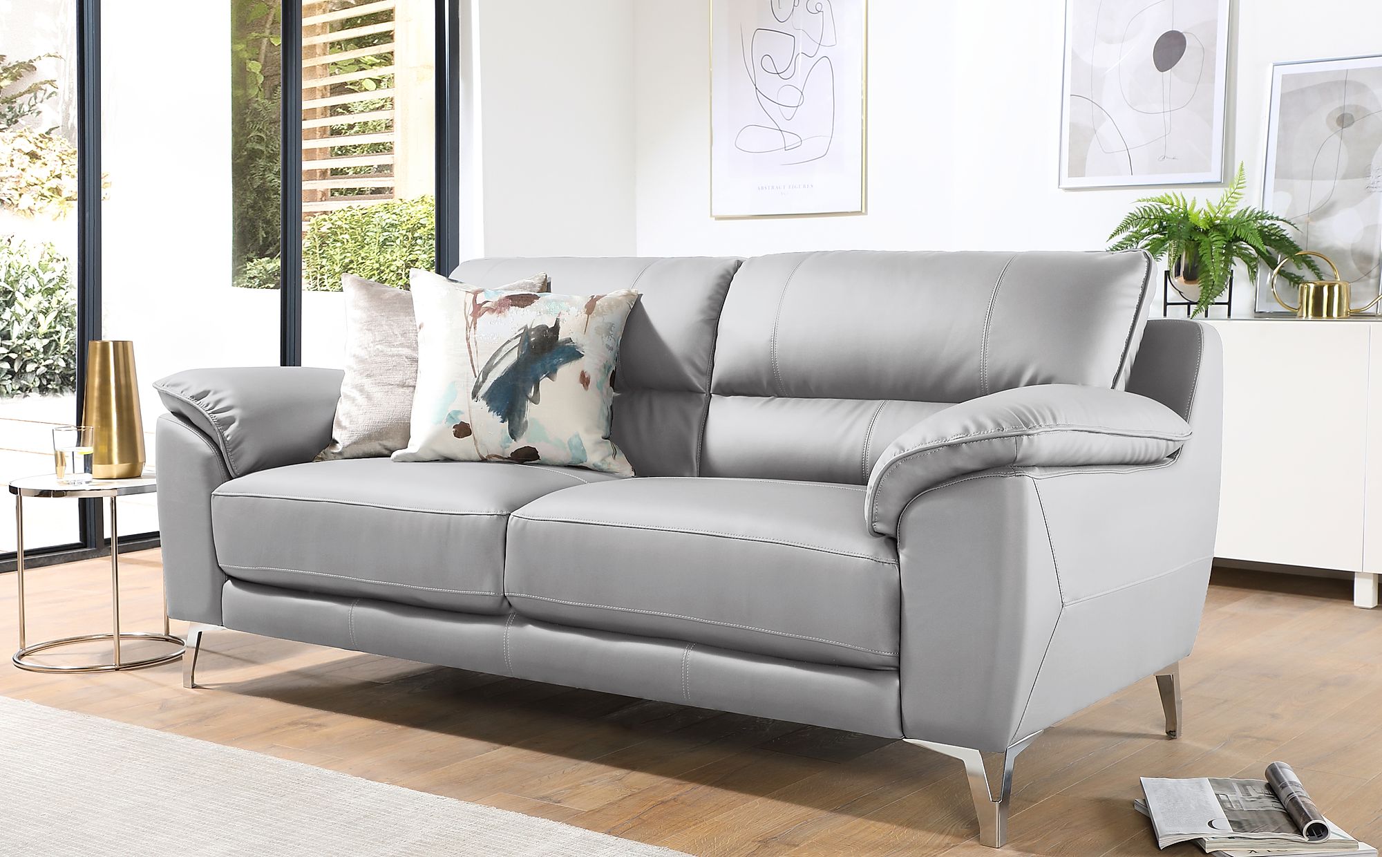 grey leather sofa with chrome legs