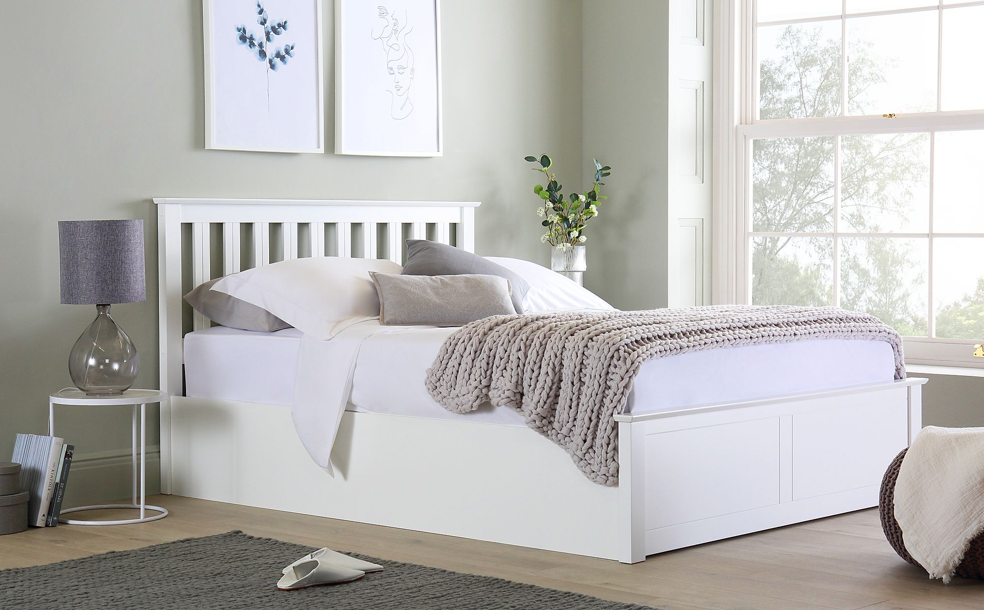 white wooden ottoman bed with mattress
