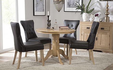 Kingston Round Dining Table & 4 Bewley Chairs, Natural Oak Finished Solid Hardwood, Black Classic Faux Leather, 90cm