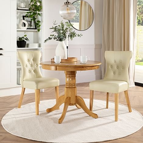 Kingston Round Dining Table & 2 Bewley Chairs, Natural Oak Finished Solid Hardwood, Ivory Classic Faux Leather, 90cm