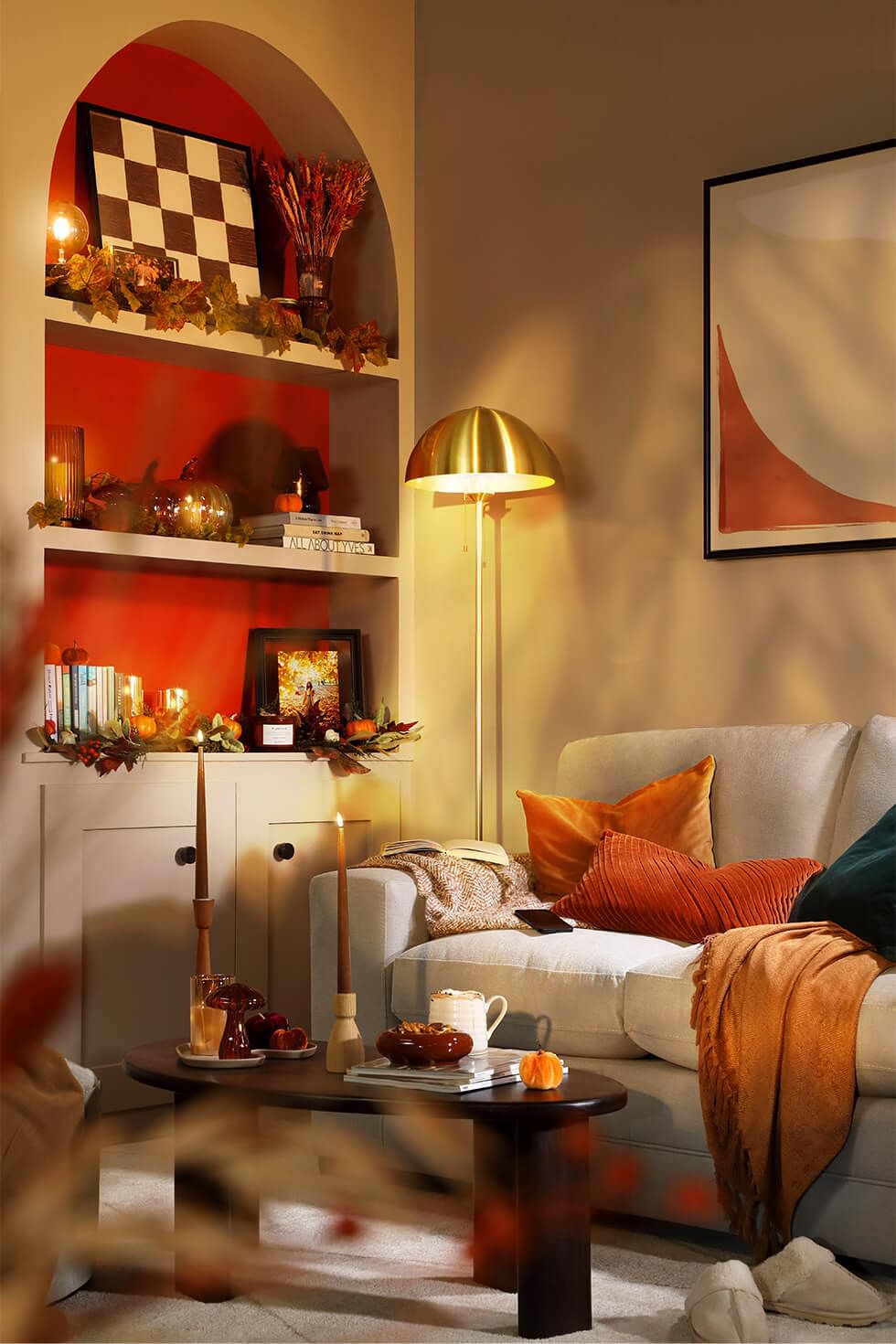 Earthy living room with bright pops of red and orange