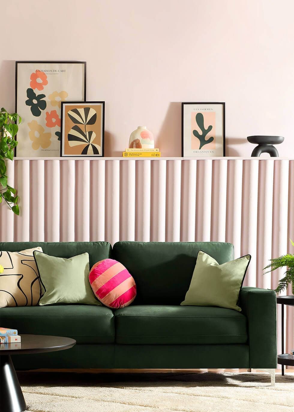 Maximalist living room with pink and green colour blocking