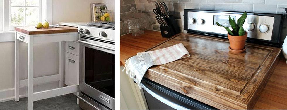 A pull-out drawer with a flat surface and a stove top covered with a wooden chopping board.