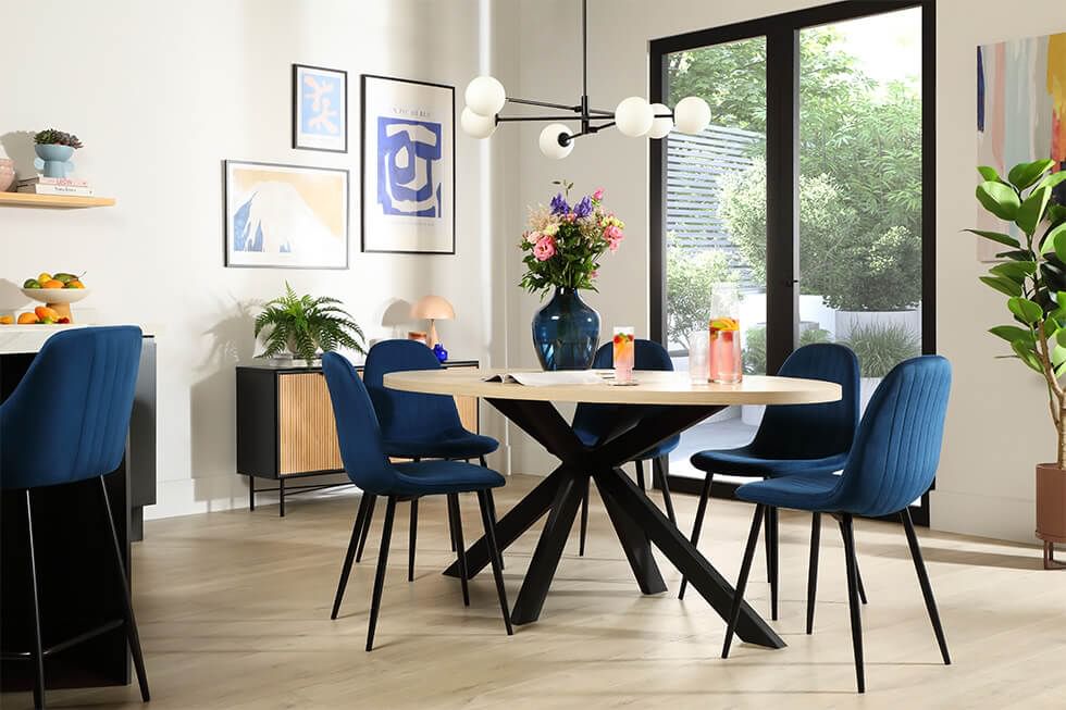 Dining room with bare windows and bright pops of colour