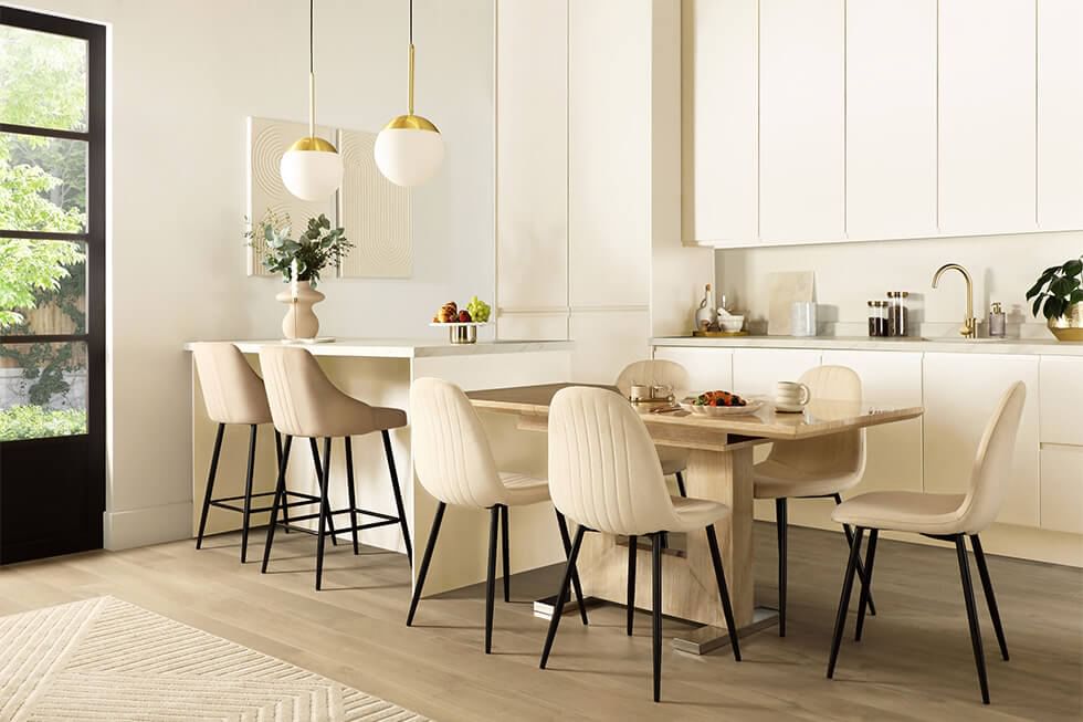 Stylish kitchen island connected to a marble dining set