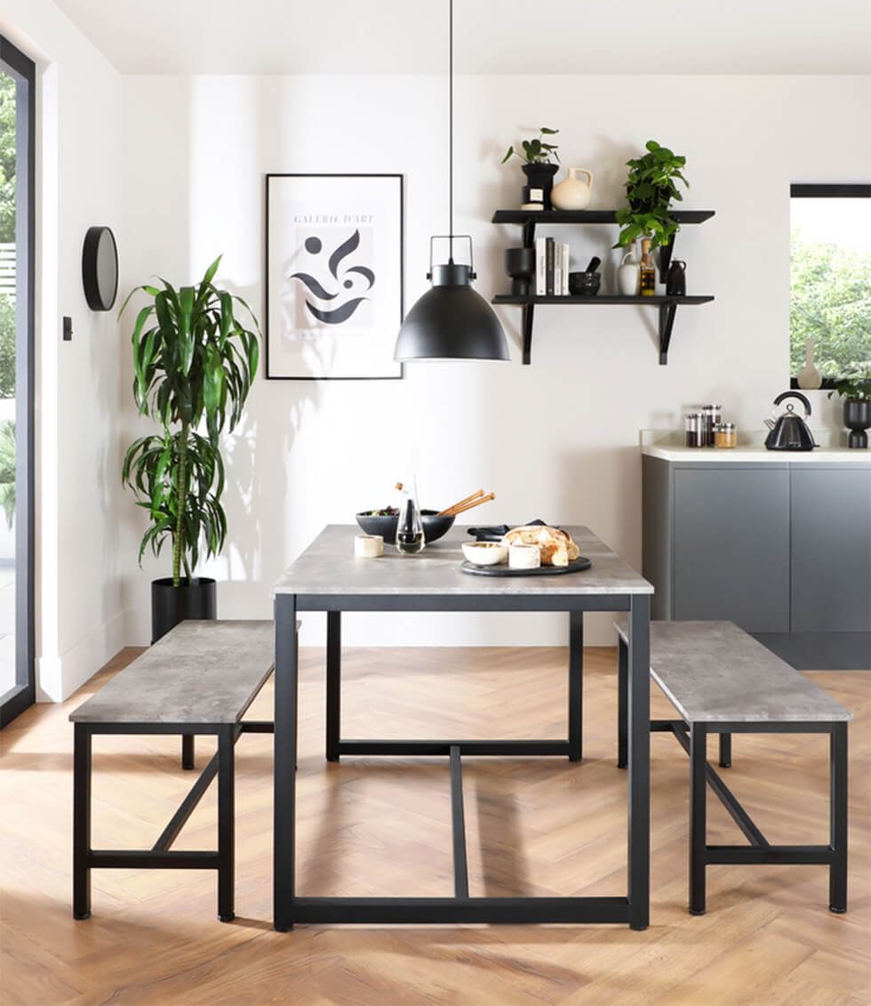 Open plan kitchen area with shelving and display