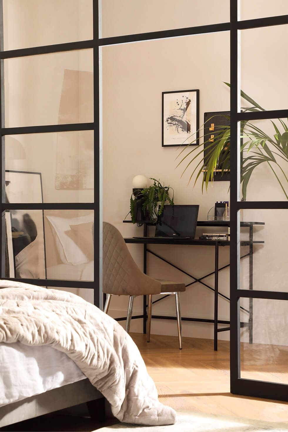 Room divider between bedroom and workspace